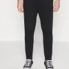 YOURTURN UNISEX - Pantaloni Sportivi - Black -Youturn Abbigliamento Negozio 2d400898b5204a93873bdc0ac1141f2d