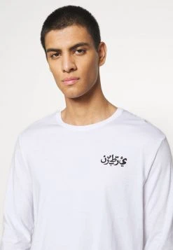 YOURTURN Maglietta A Manica Lunga - White, Donna 11 YOURTURN Maglietta A Manica Lunga - White, Donna -Youturn Abbigliamento Negozio a45e52ac25ef4600a4112efb4ff78283